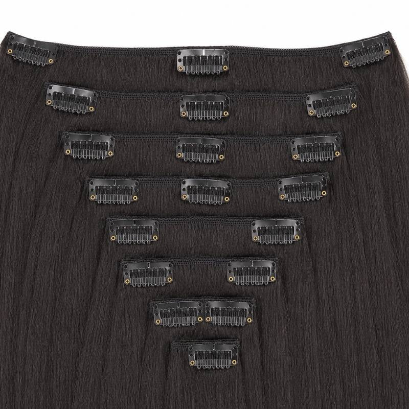 Full set of natural black yaki straight clip-in hair extensions laid out in graduated widths with black snap clips sewn along each weft