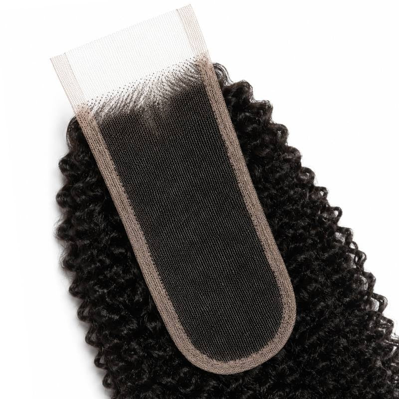 Close-up of the narrow HD lace closure panel and its parting on natural black afro kinky curly hair extensions