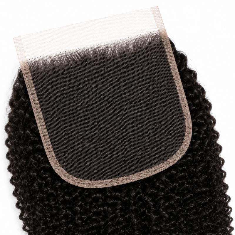 Close-up of the square HD lace closure panel and hairline knots on natural black afro kinky curly hair extensions