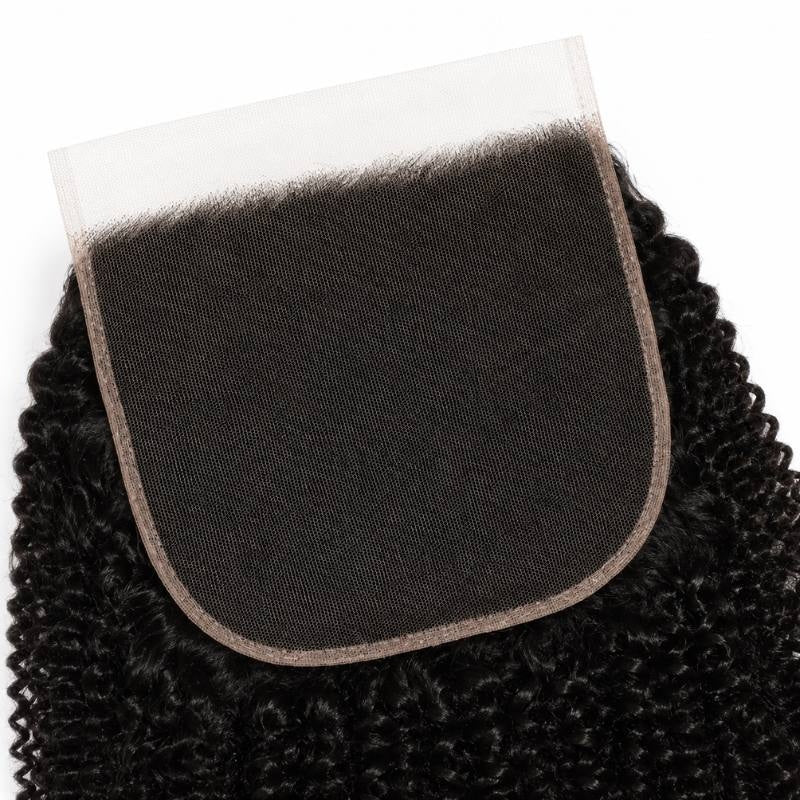 Close-up of the wide square HD lace closure panel and knotted hairline on natural black afro kinky curly hair extensions