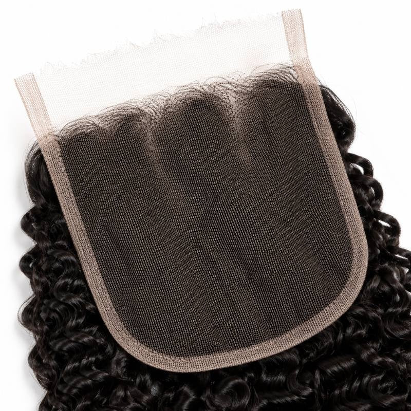 Underside of the HD lace base on natural black kinky curly closure hair extensions showing the scalloped hairline and stitched border