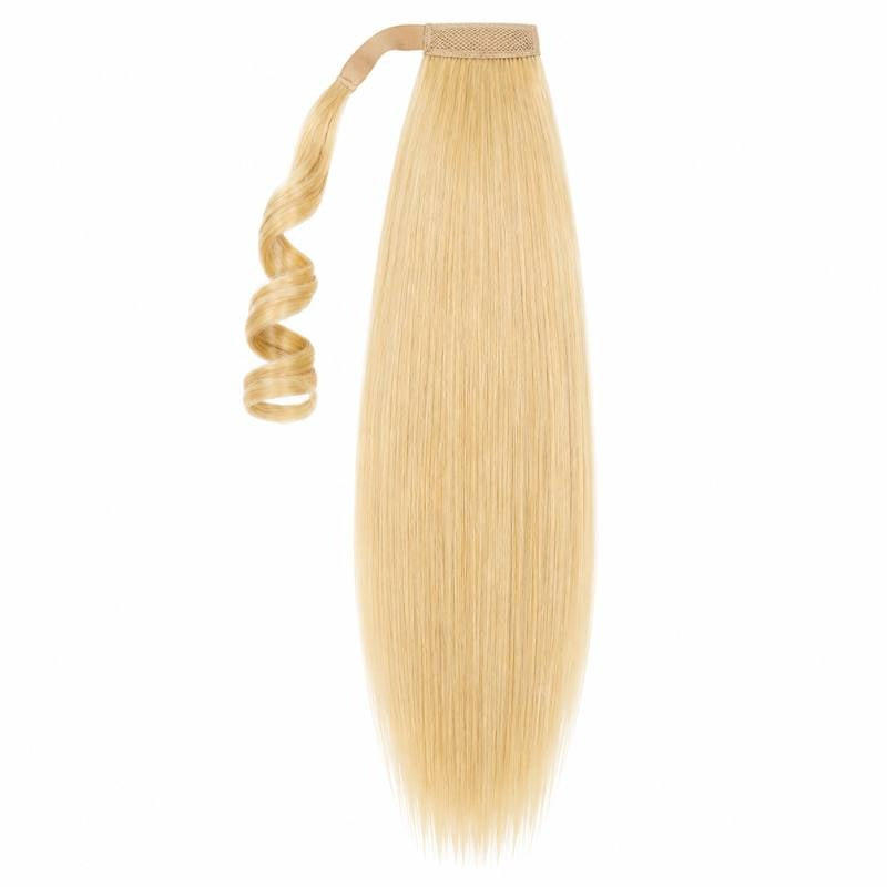 Whole blonde straight ponytail hair extensions piece shown upright with the wrap strand curling beside the fastening band