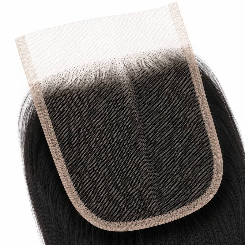 Detail of the lace panel underside on yaki straight natural black hair extensions showing the mesh weave, knot row and bound border