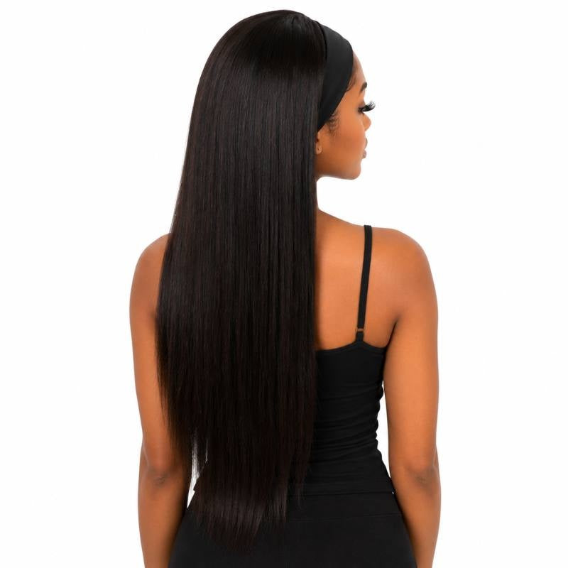 Back view of a model in a long natural black straight human hair wig with the headband visible at the crown on a white background