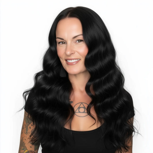 Woman with long, wavy black hair on a white background