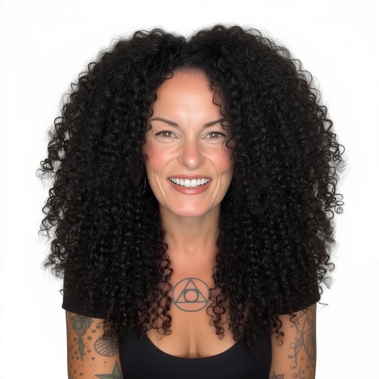Cara Eyre with voluminous black Brazilian Afro Kinky hair on a white background