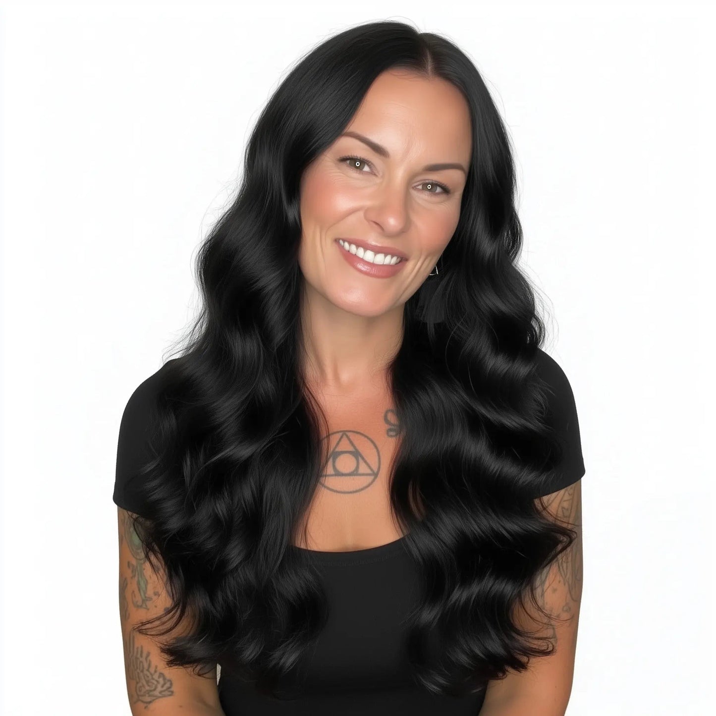 Woman with long black wavy hair on a white background