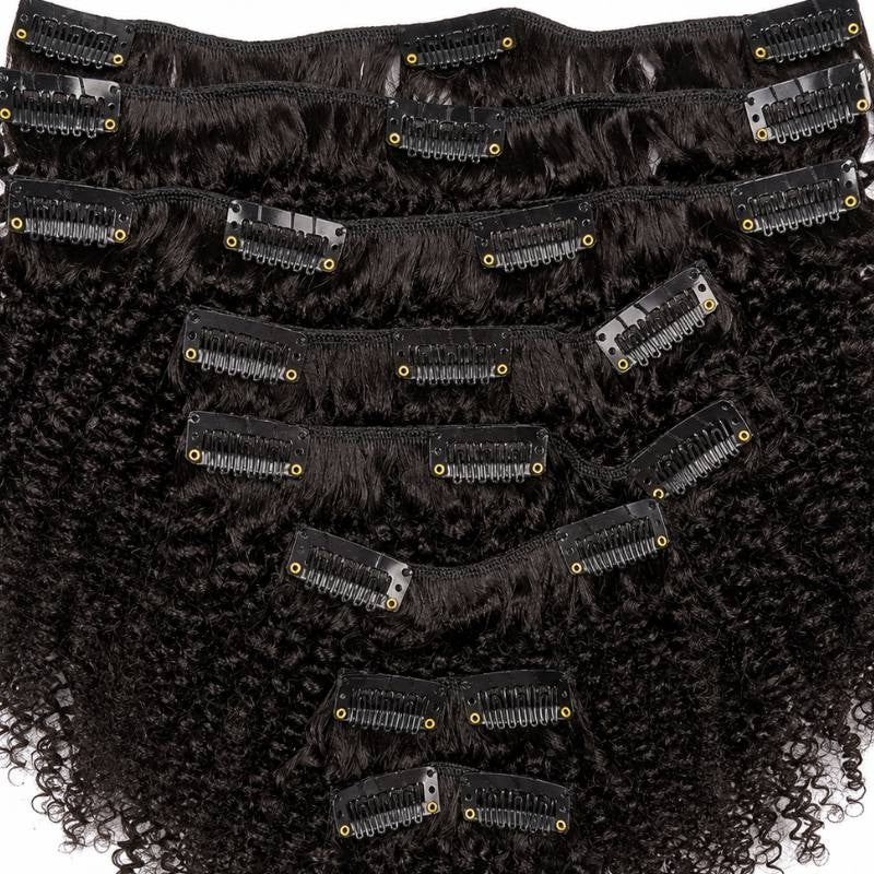 Reverse side of natural black afro kinky curly clip-in hair extensions showing the silicone lined snap clips stitched along each weft