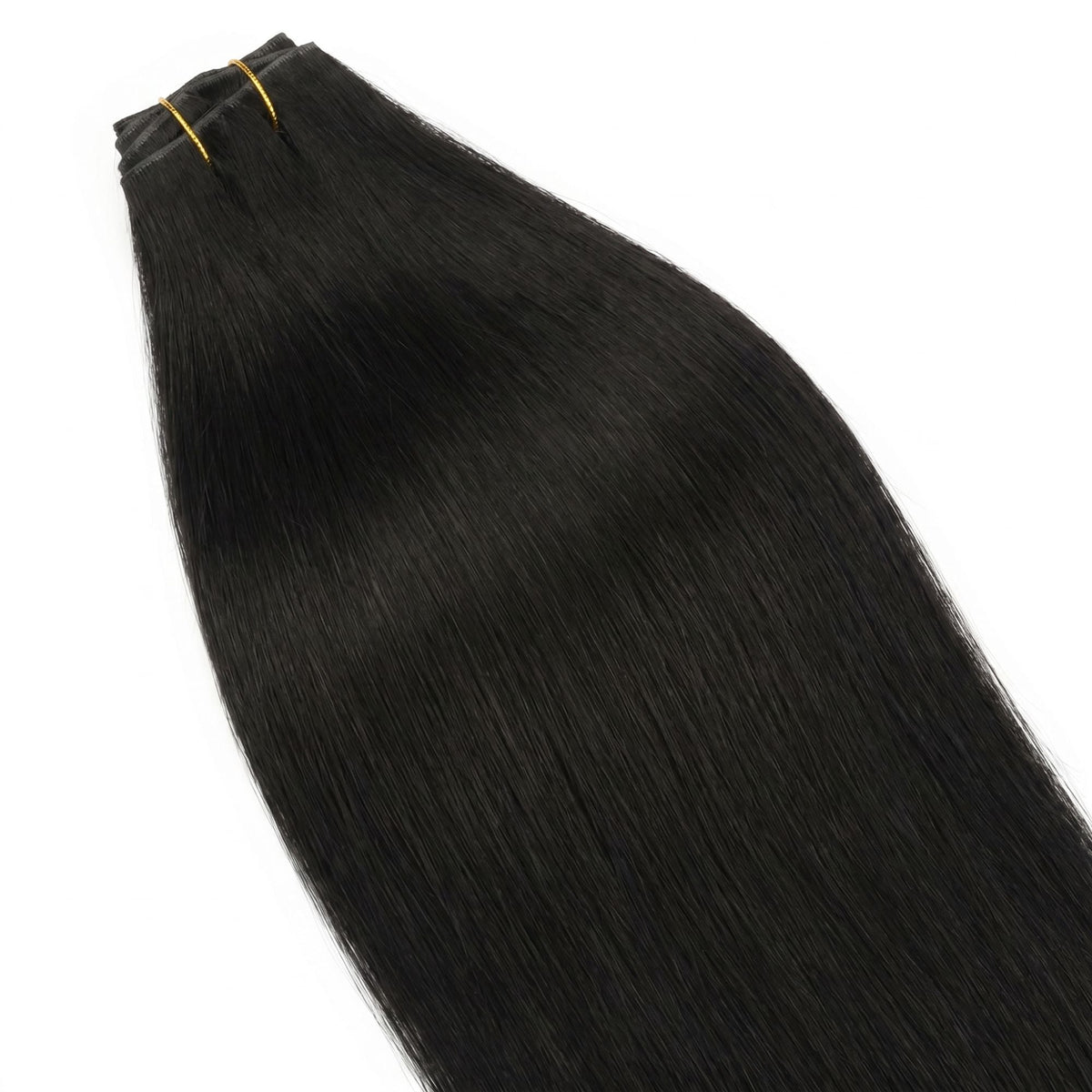 Jet black straight clip-in hair extensions laid flat on a white surface with the tied weft at the top and the hair spread below
