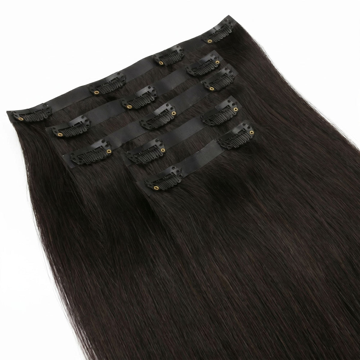 Close-up of the black snap clips and seamless bands stitched onto off black straight clip-in hair extensions