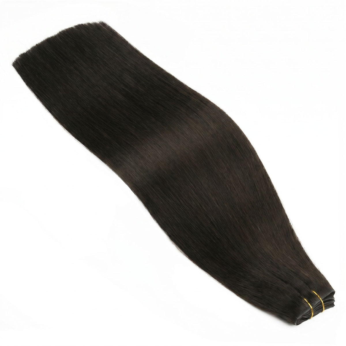 Off black straight clip-in hair extensions laid diagonally on a white surface with the tied weft at the lower end