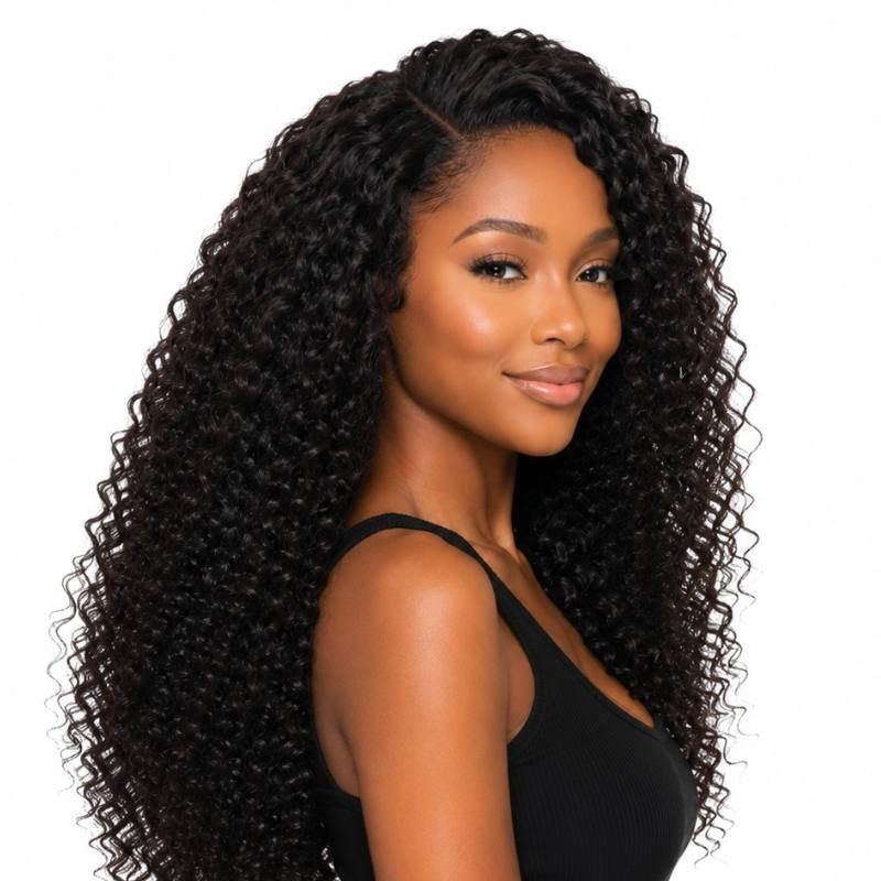 Model turned to a three quarter angle wearing natural black kinky curly clip-in hair extensions falling well past the shoulders