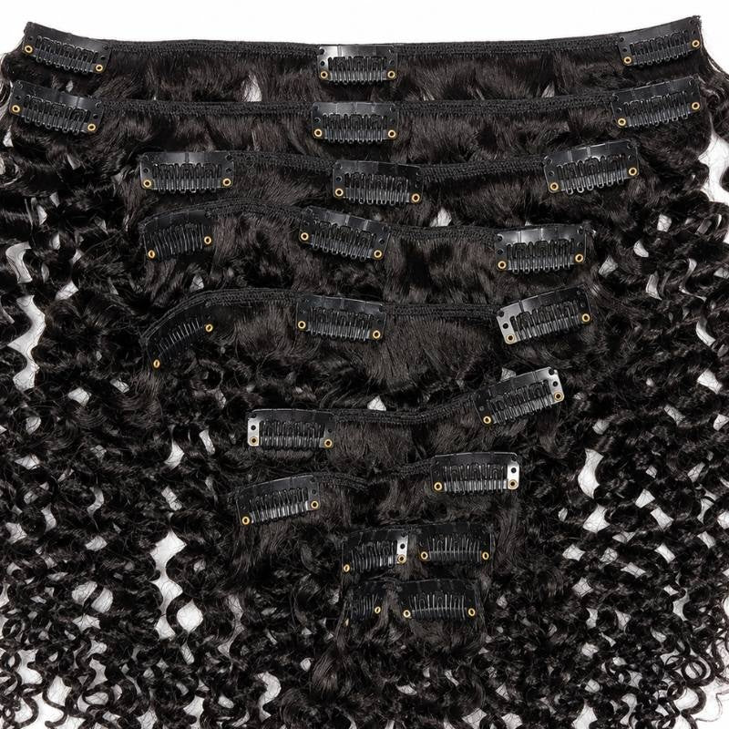 Reverse side of natural black kinky curly clip-in hair extensions showing the snap clips fastened along every weft
