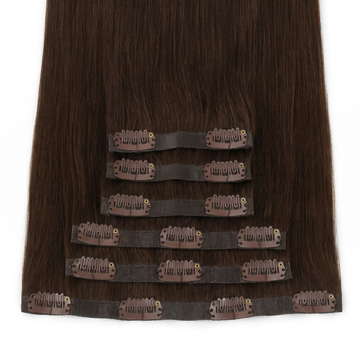 Straight on view of dark brown clip-in hair extensions showing rows of snap clips along each flat seamless weft