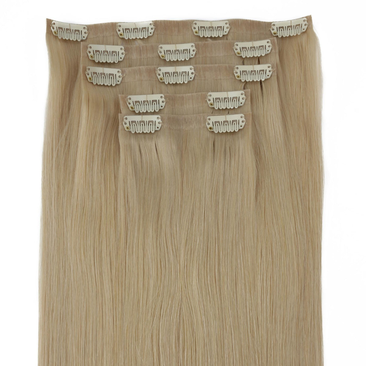 Warm Honey Blonde Seamless Clip-ins - full set of wefts laid flat