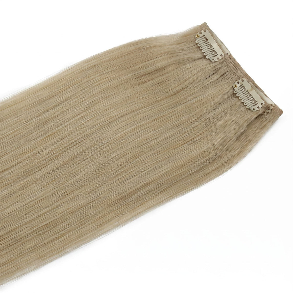 Two seamless wefts of honey blonde straight clip-in hair extensions overlapping with pale snap clips on the flat bands