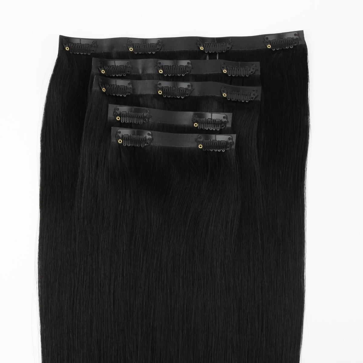 Jet Black Seamless Clip-ins - full set of wefts laid flat