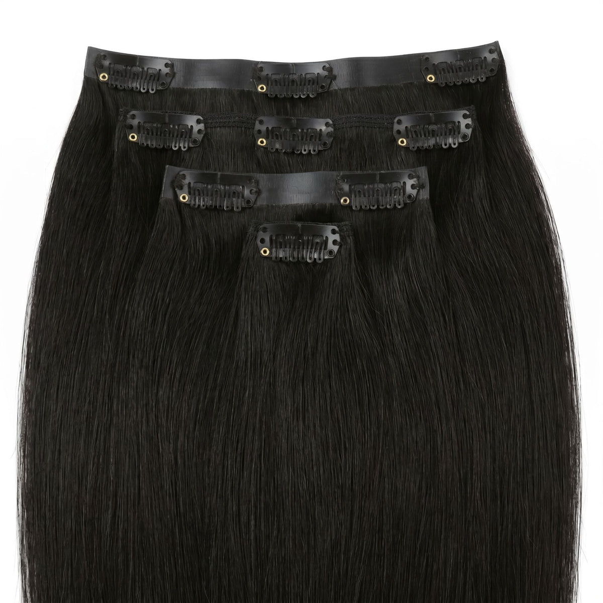 Full set of off black straight clip-in hair extensions laid flat with the seamless bands and black snap clips facing up
