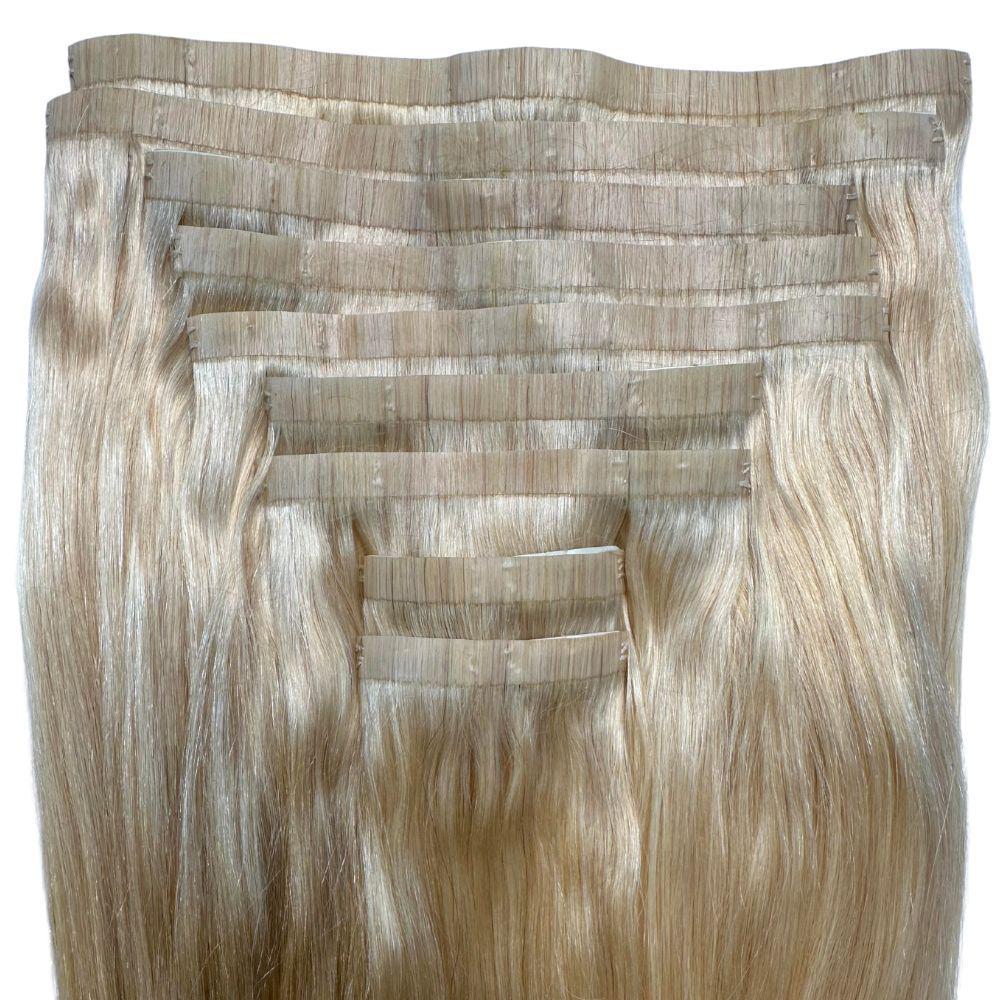 Clip In Hair Extensions - Straight Seamless - Blonde (613) - full set laid flat showing seamless wefts