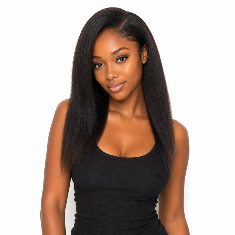 Model in a black tank top wearing natural black yaki straight clip-in hair extensions with a middle part against a white background