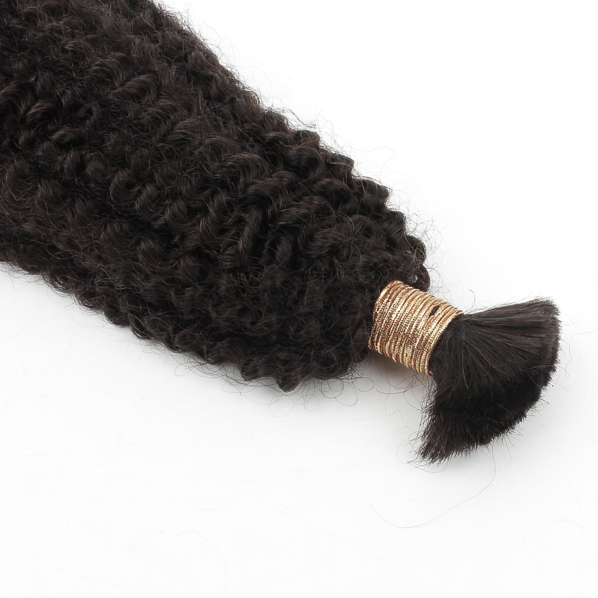 Close-up of the gold band binding the tied end of natural black afro kinky curly hair extensions supplied in bulk without a weft