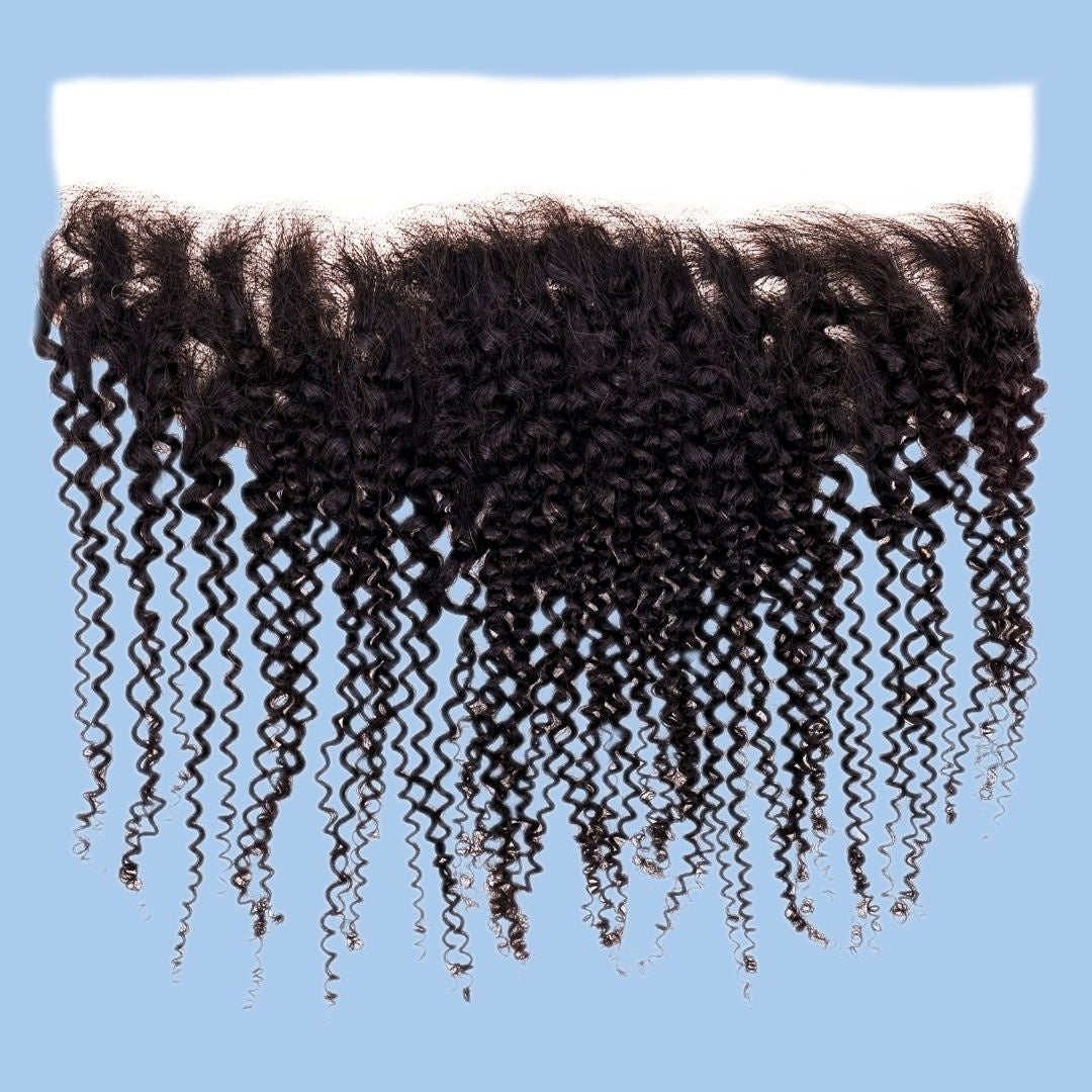 Natural black afro kinky curly hair extensions on a transparent lace frontal laid flat on a pale blue backdrop, showing corkscrew curls
