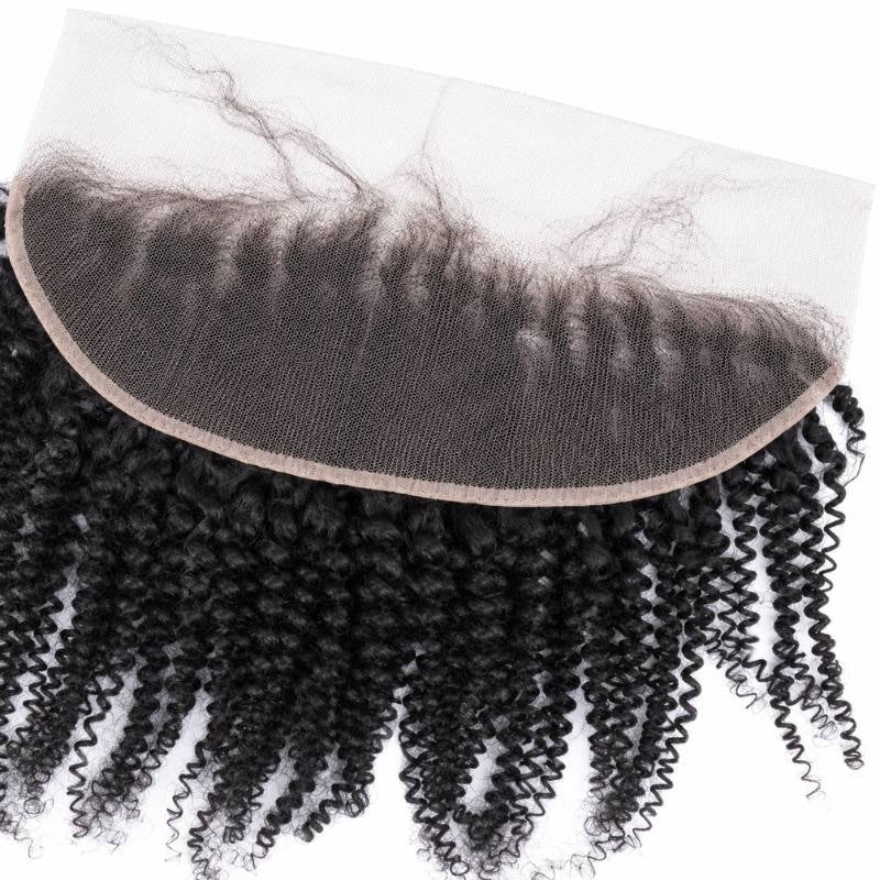 Angled close-up of the curved transparent lace band on natural black afro kinky curly hair extensions, showing the knotted hairline