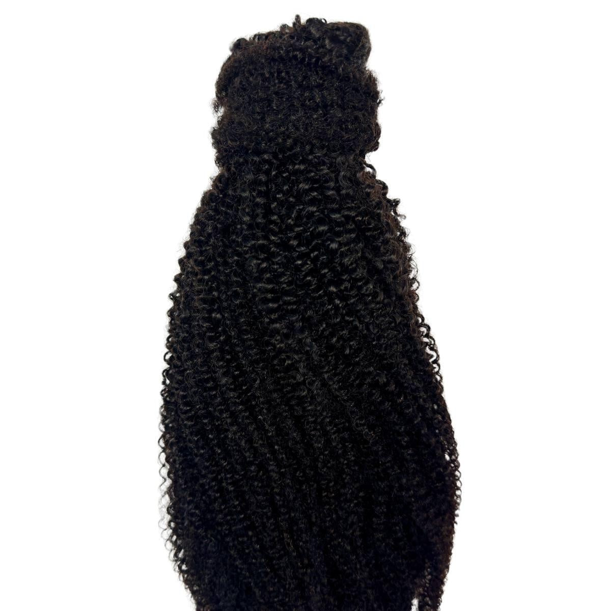 Afro Kinky Curly Ponytail - Afro kinky curly natural black 1B human hair ponytail hanging full length showing dense springy coils