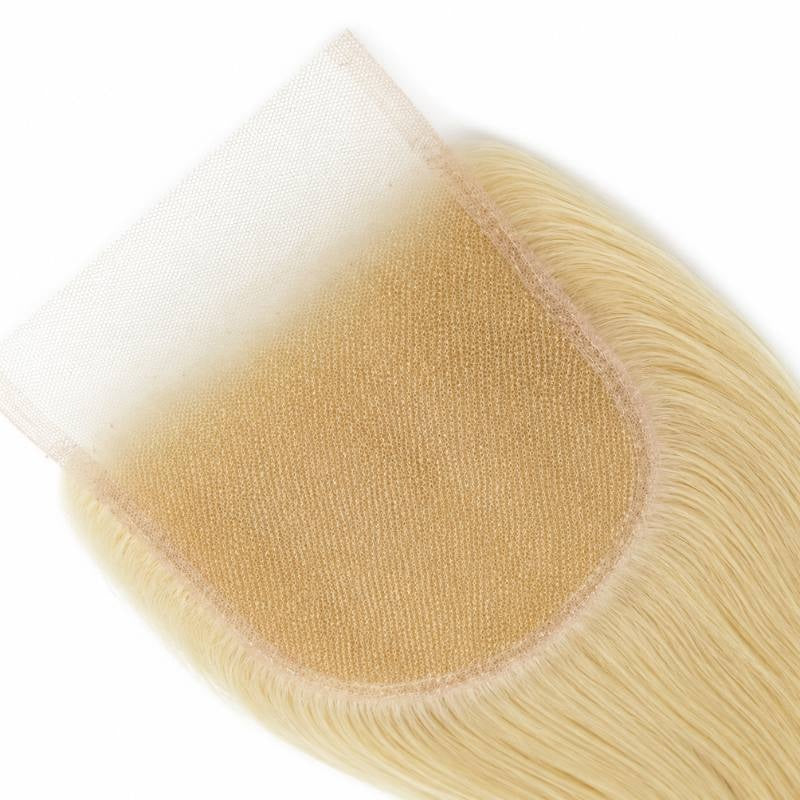 Close-up of the square transparent lace closure panel with blonde straight hair extensions knotted along its border