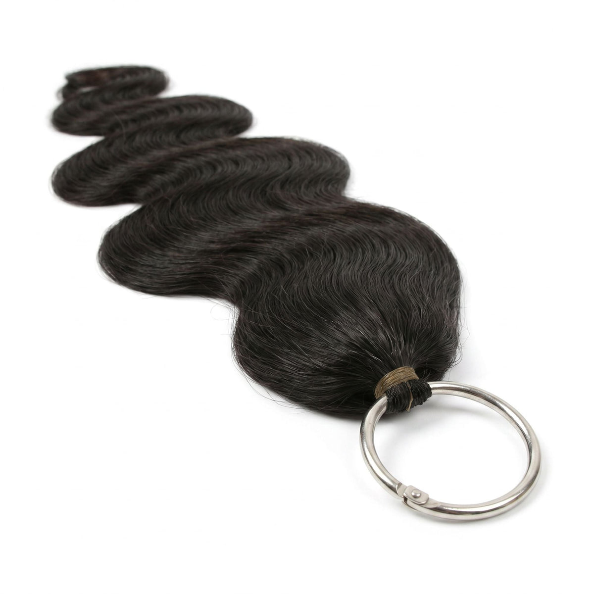 Angled close-up of the metal ring and thread binding at the top of a natural black body wave crochet hank of hair extensions