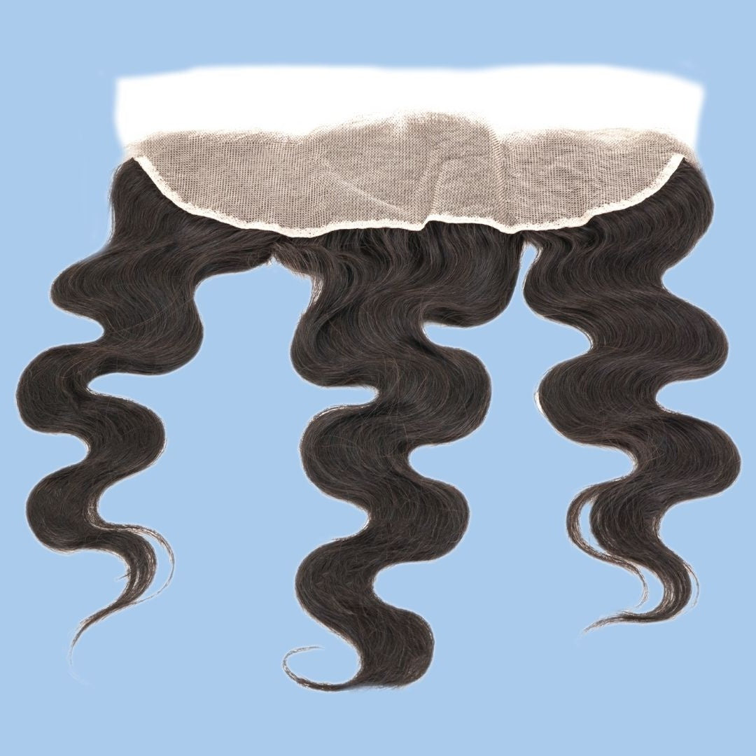 Reverse of the natural black body wave transparent frontal on blue showing the inside of the lace panel with the hair extensions hanging in waves