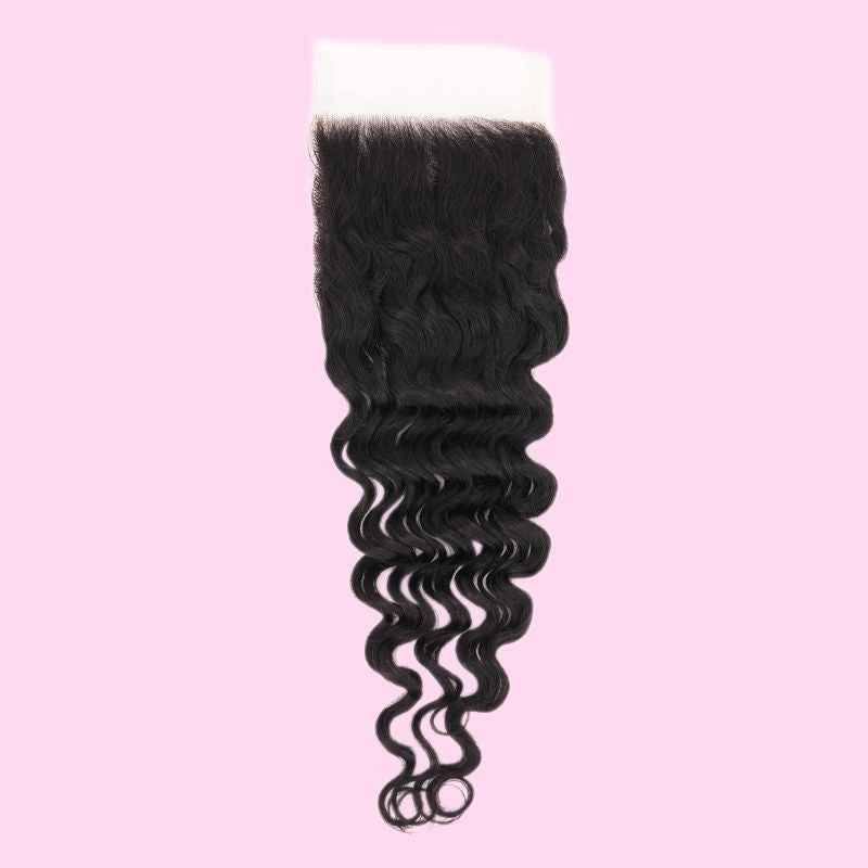Natural black 4x4 HD closure on a pink background with the lace panel at the top and deep wave hair extensions curling to the tips