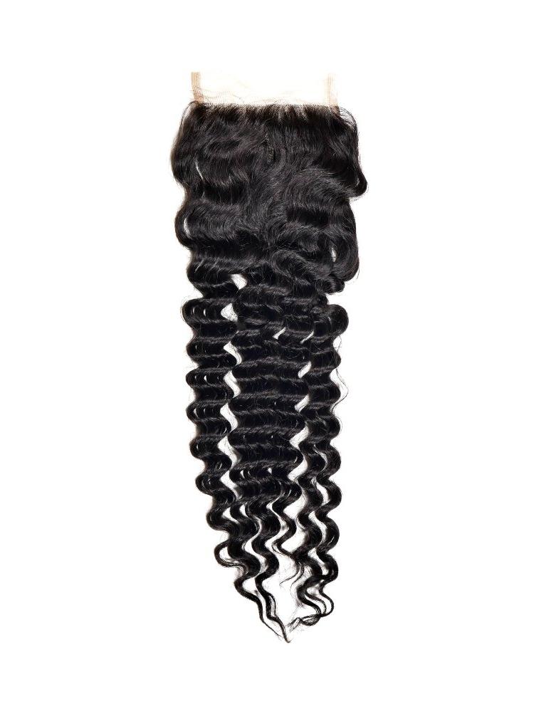 Natural black 4x4 transparent closure on white with a narrow lace panel at the top and the tight curl of the deep wave hair extensions below
