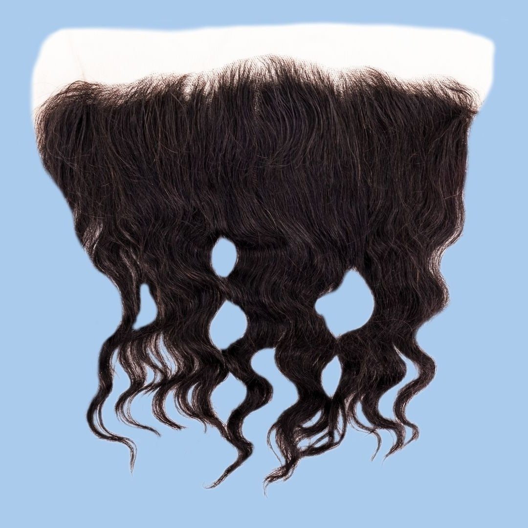 13x4 transparent frontal laid flat on a blue background showing the full width of the natural black loose wave hair extensions