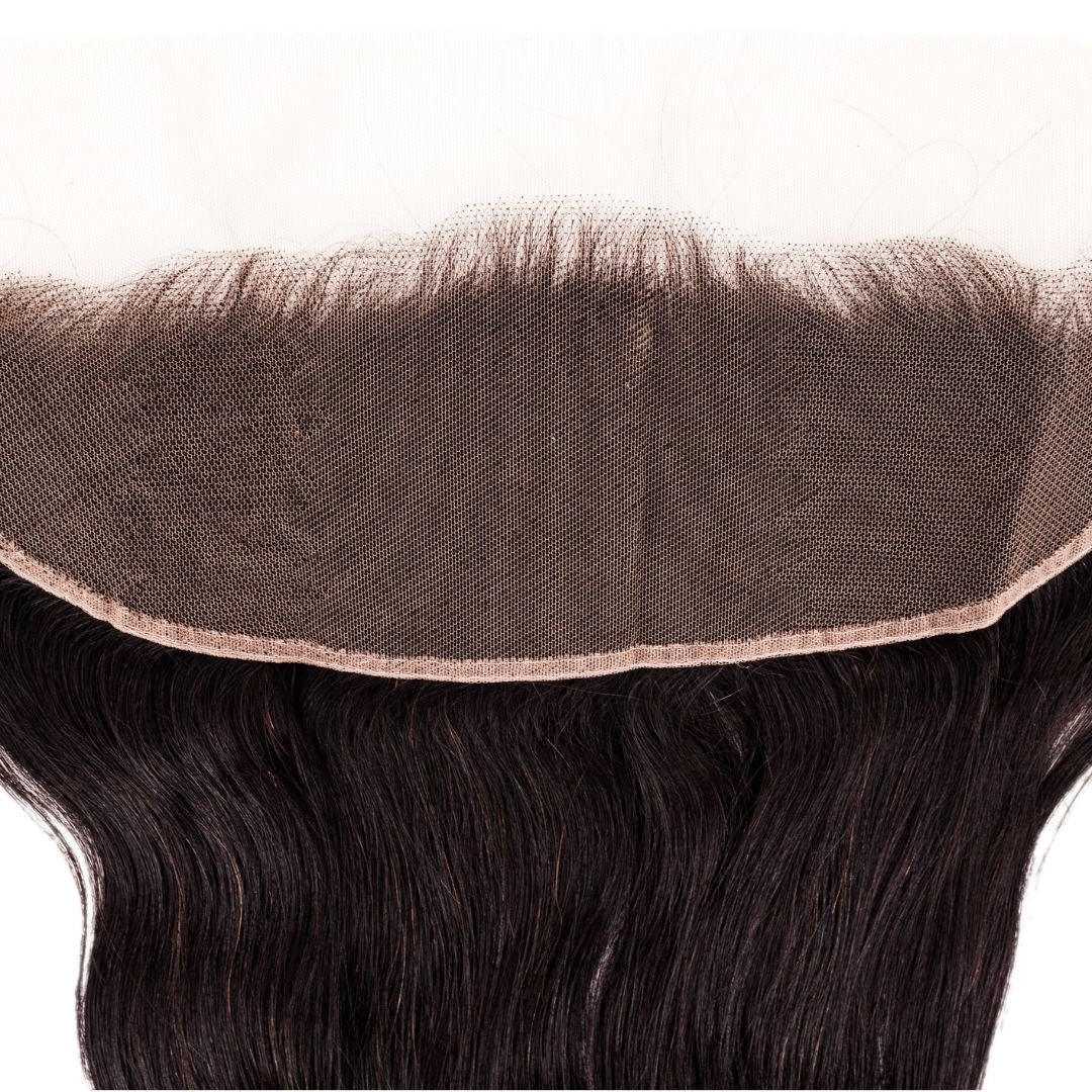 Close-up of the transparent lace mesh and stitched edge on the frontal with straight natural black hair extensions below
