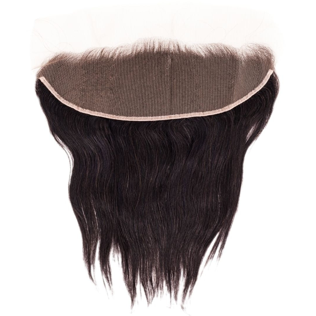 Transparent lace panel folded back on a white background above the straight natural black hair extensions of the frontal