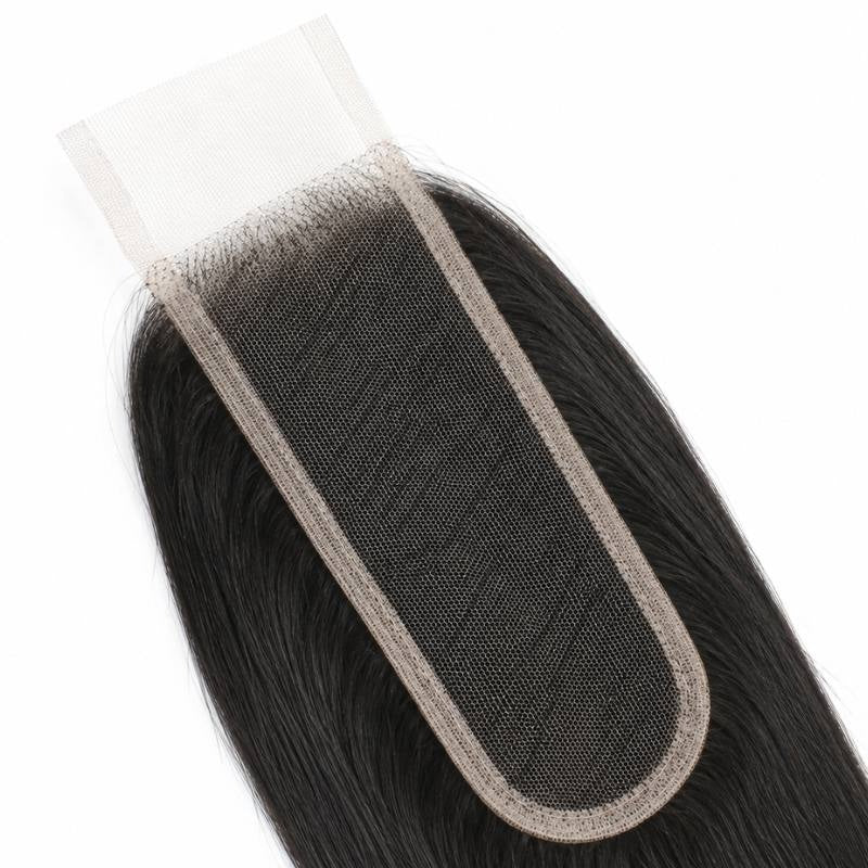 Underside of the 2x6 transparent closure showing the narrow lace strip and knotted hairline on straight natural black hair extensions