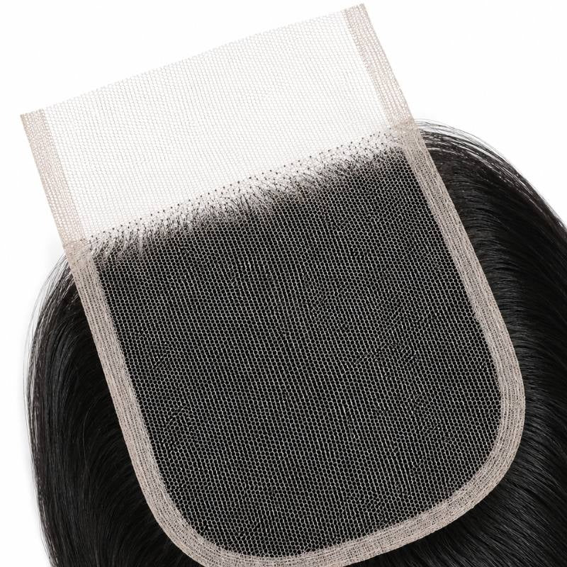 Underside of the 4x4 transparent closure showing the lace mesh, bound edge and knotted hairline on straight natural black hair extensions