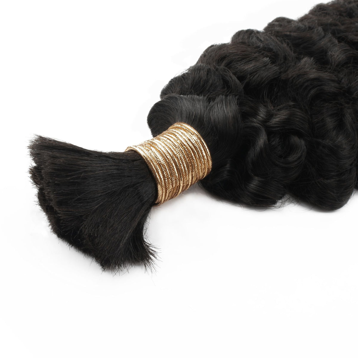 Close-up of the gold thread binding at the root of a bundle of natural black curly bulk braiding hair extensions