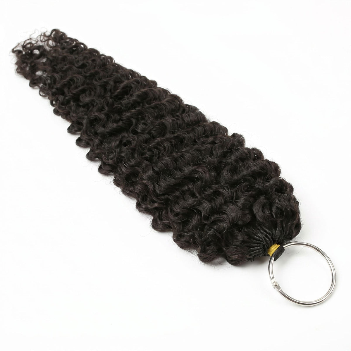 Full bundle of natural black curly crochet hair extensions laid diagonally with its metal loop ring on a white background