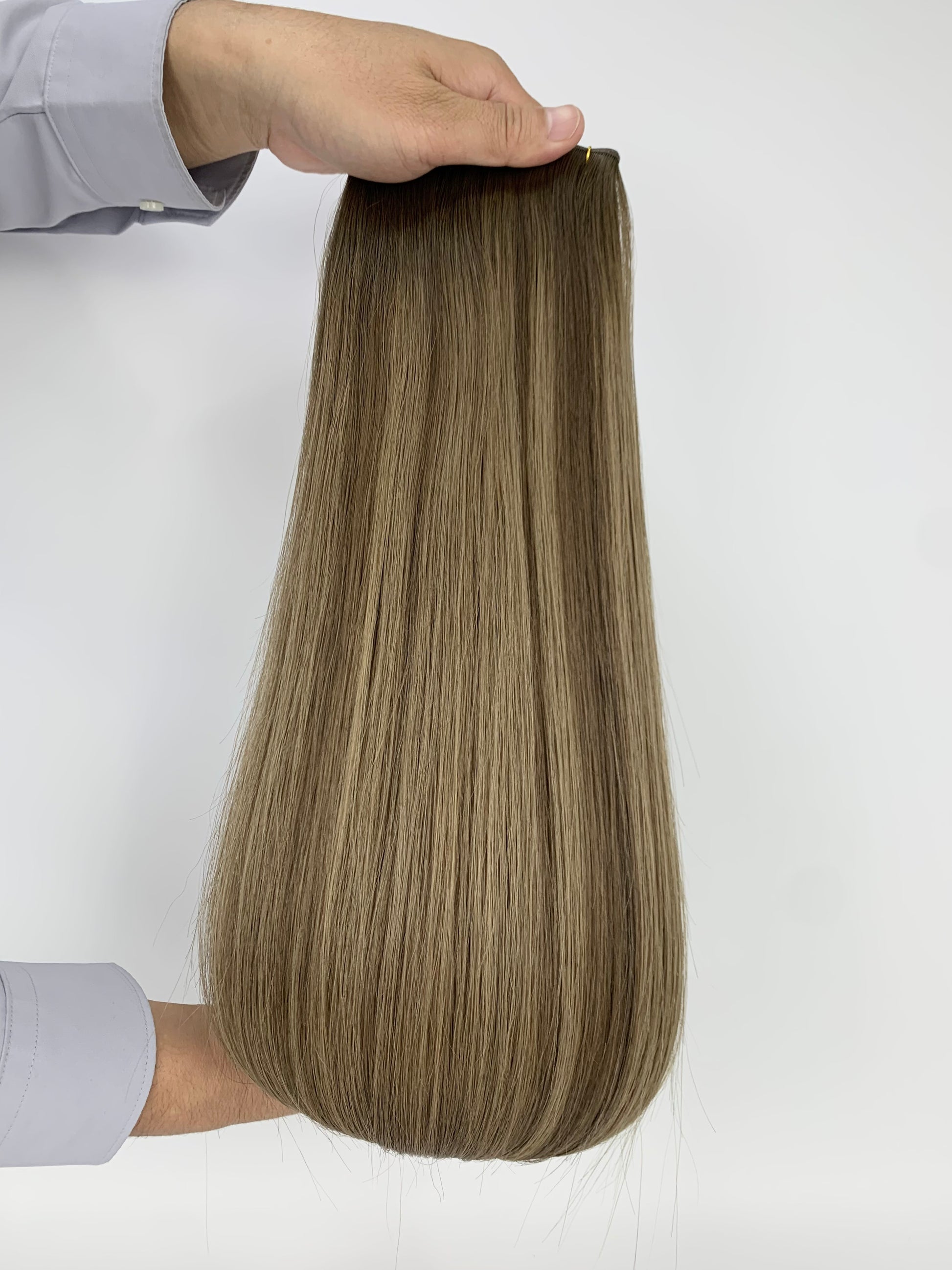 Butterfly Genius Weft - 100% Virgin Human Hair Extensions - dark blonde balayage (#TAL) color swatch