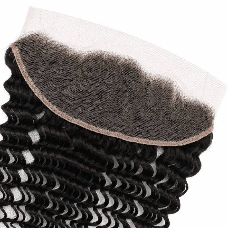 Underside of the 13x4 HD lace frontal showing the lace panel and bound edge above natural black deep wave hair extensions