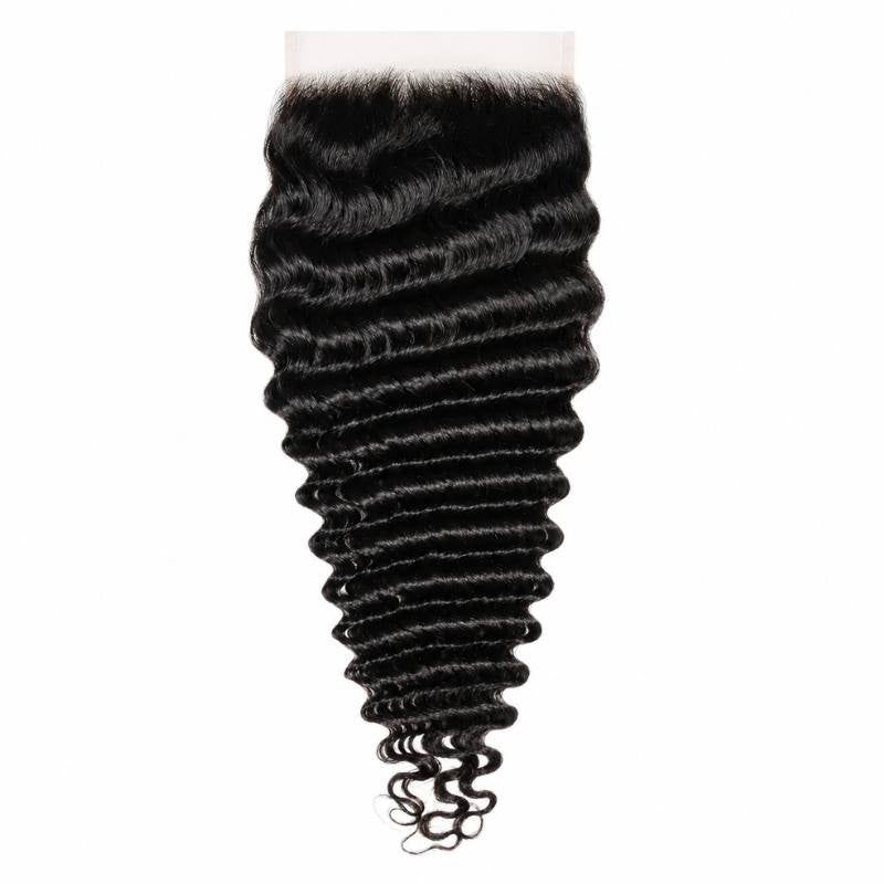 7x7 HD lace closure laid flat on a white background showing the deep wave crimp of natural black hair extensions