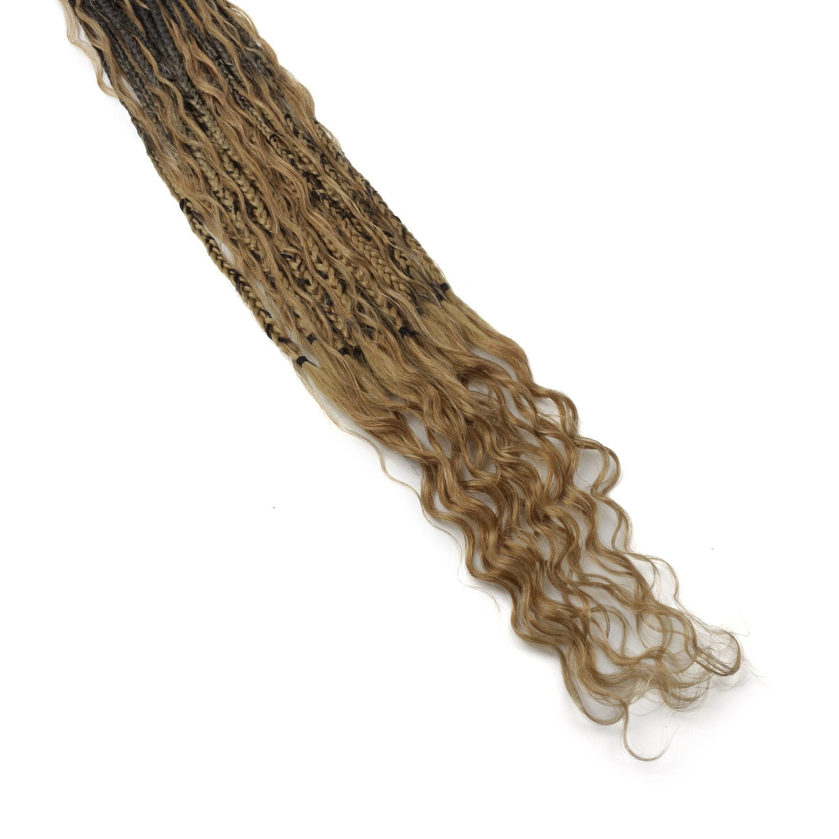 Honey blonde ombre boho braids laid flat on white showing the braided sections and loose deep wave ends of the hair extensions