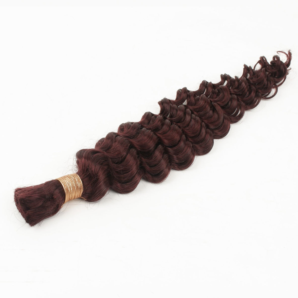 Single bundle of burgundy deep wave bulk braiding hair extensions laid diagonally on white with the gold thread tie at the root