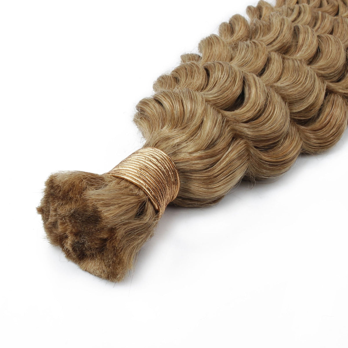Close-up of the gold thread wrapped tip on a bundle of honey blonde deep wave bulk braiding hair extensions showing the cut ends