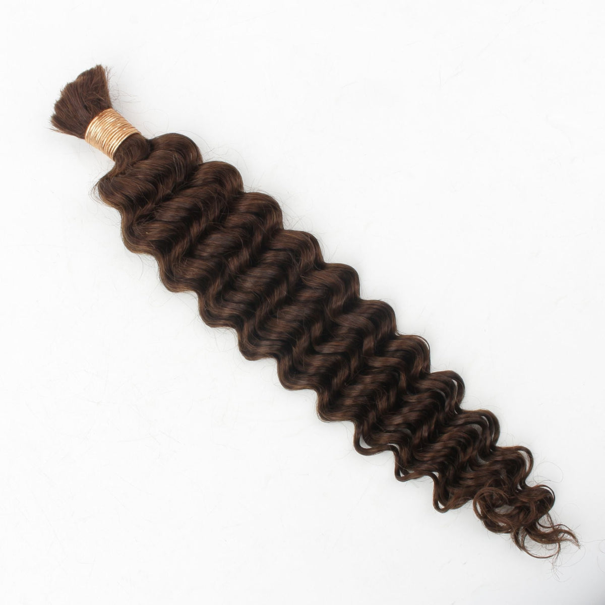 Bundle of medium brown deep wave bulk braiding hair extensions laid at an angle on white showing the thread wrapped top and wave pattern