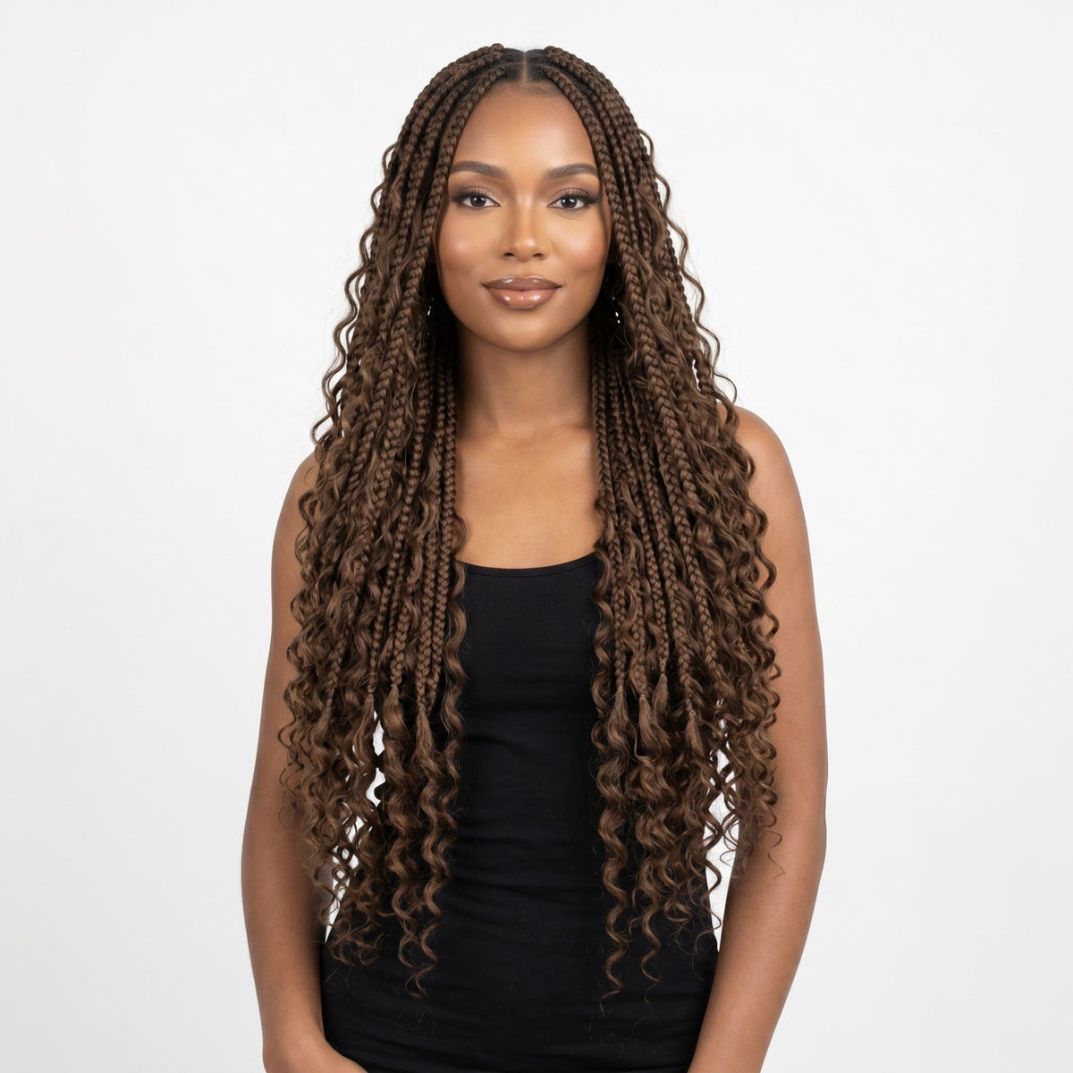 Model wearing medium brown deep wave bulk braiding hair extensions in long box braids with loose curly ends on a white background