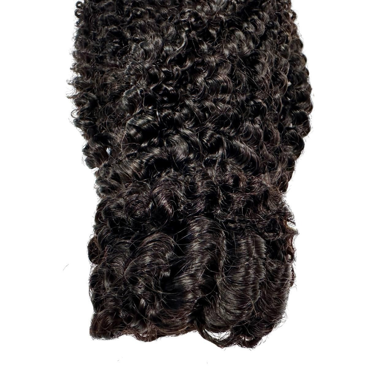 Jerry Curl Ponytail - Jerry curl natural black 1B human hair ponytail detail showing glossy defined ringlet curls