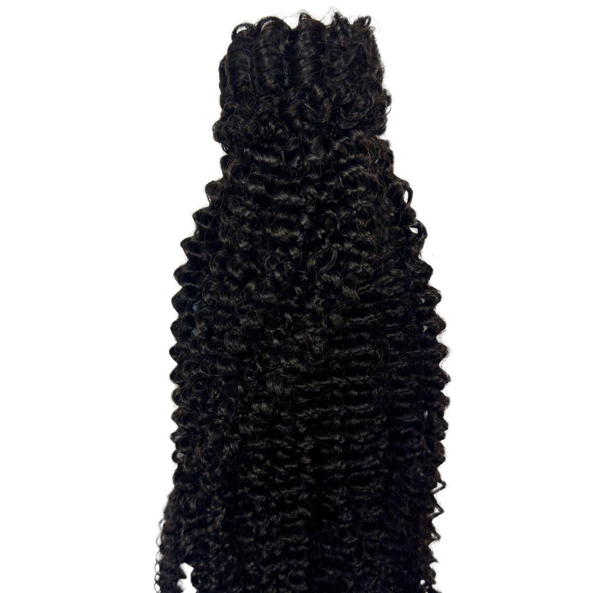 Jerry Curl Ponytail - Jerry curl natural black 1B human hair ponytail hanging full length showing defined spiral curl texture